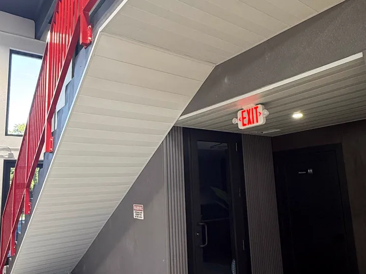 Metal panels below stair detail
