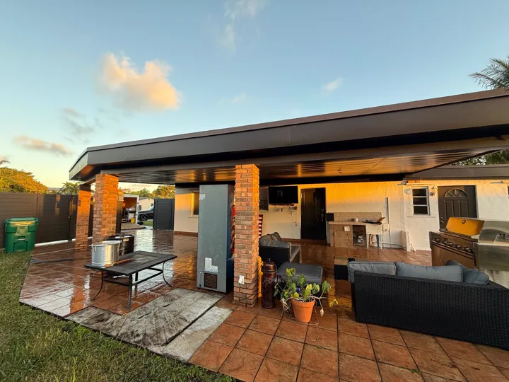 Dark metal soffit under covered patio