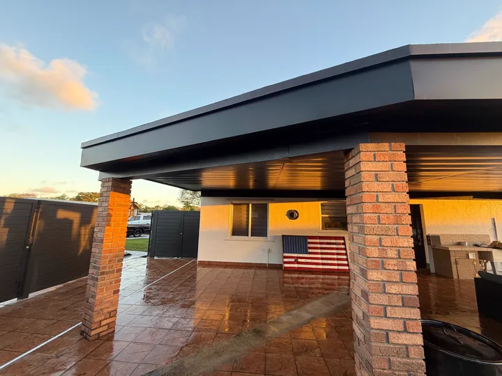 Covered patio with dark metal fascia