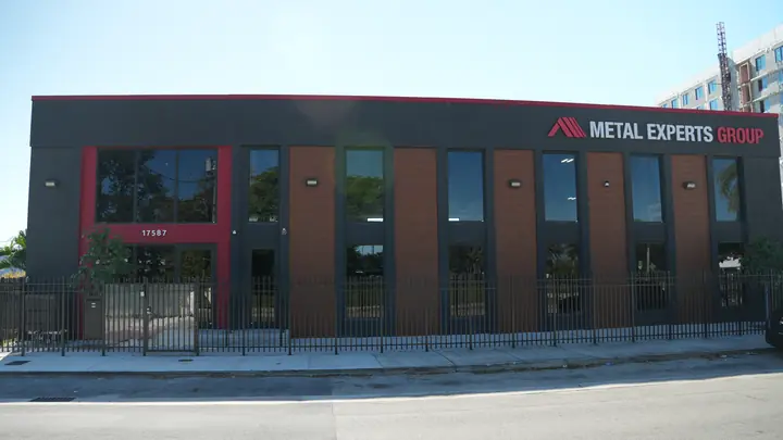 Metal Experts Group facade clad with wood-look and brick-look metal wall panels in Miami